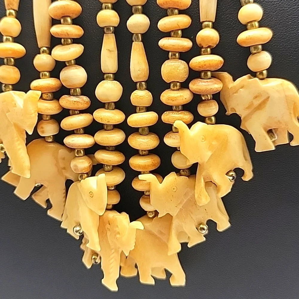 VTG Statement Tribal Bone Bovine Elephant Charm Beaded Gold Tone Necklace Ethnic